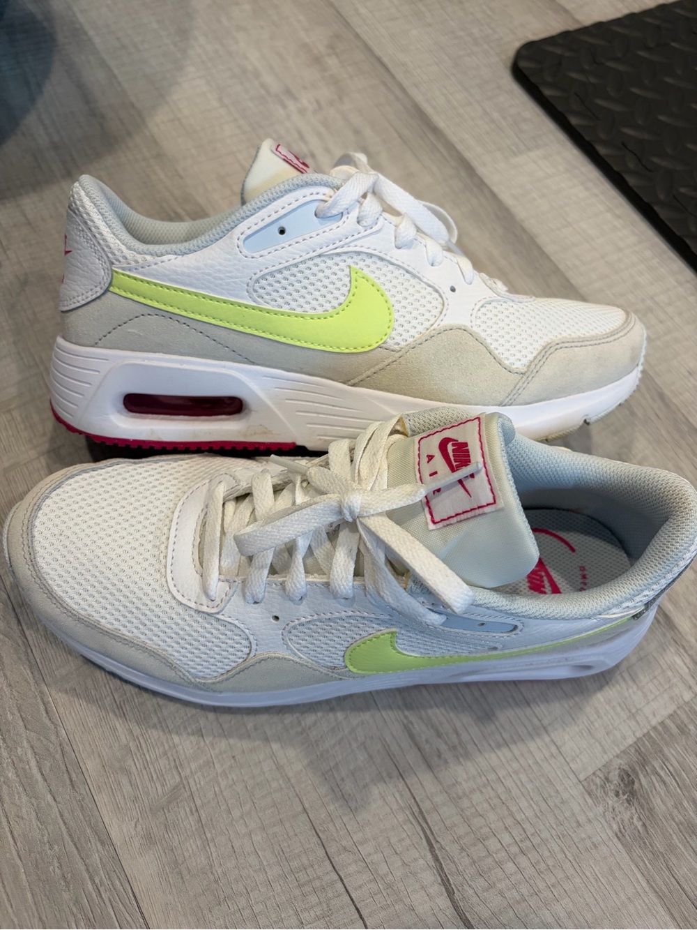 Nike White Sneakers with Neon Yellow Swoosh